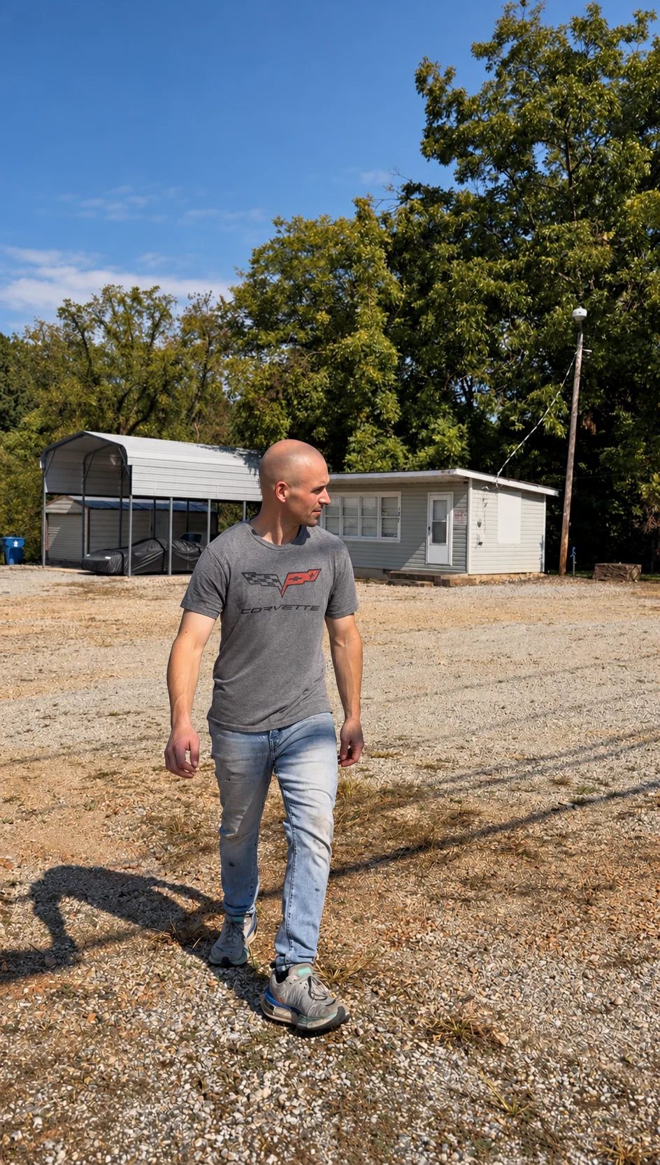 Cory walking across the Felony Motor Co. lot